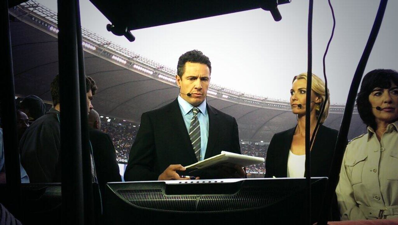 Cuomo listens as President Barack Obama delivers his eulogy for Mandela at FNB Stadium.