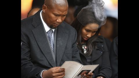 Mandla Mandela, left, grandson of Nelson Mandela, attends the memorial service.