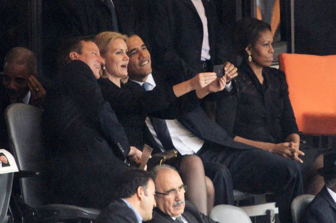 Denmark's Prime Minister Helle Thorning-Schmidt snaps a selfie with British Prime Minister David Cameron and U.S. President Barack Obama during the memorial service of former South African President Nelson Mandela in Johannesburg on Tuesday, December 10. 