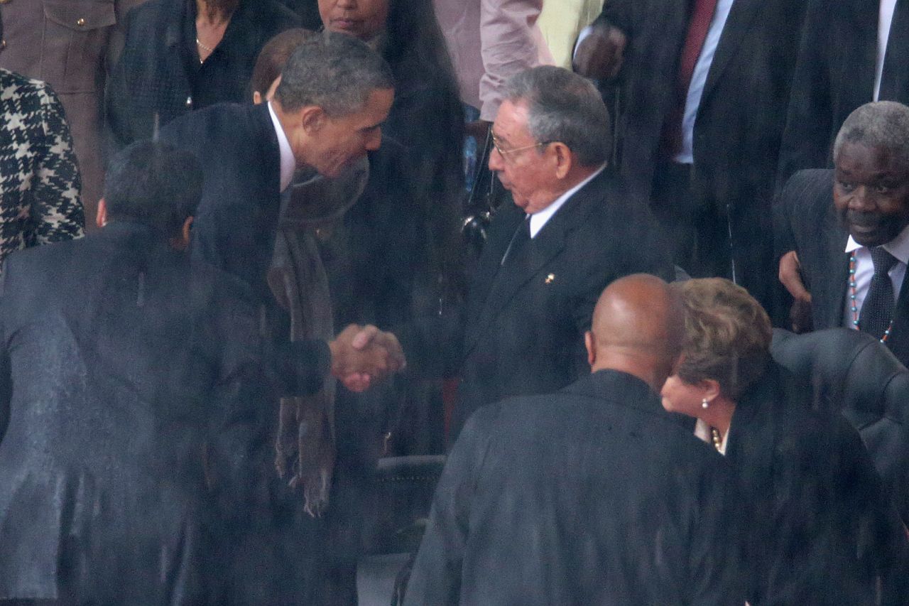 U.S. President Barack Obama shakes hands with Cuban President Raul Castro during the official memorial service for former South African President Nelson Mandela on Tuesday, December 10, in Johannesburg, South Africa. The U.S. and Cuba have not had diplomatic relations since the Cuban Revolution more than 50 years ago. Click through the gallery for more handshakes that have made history: