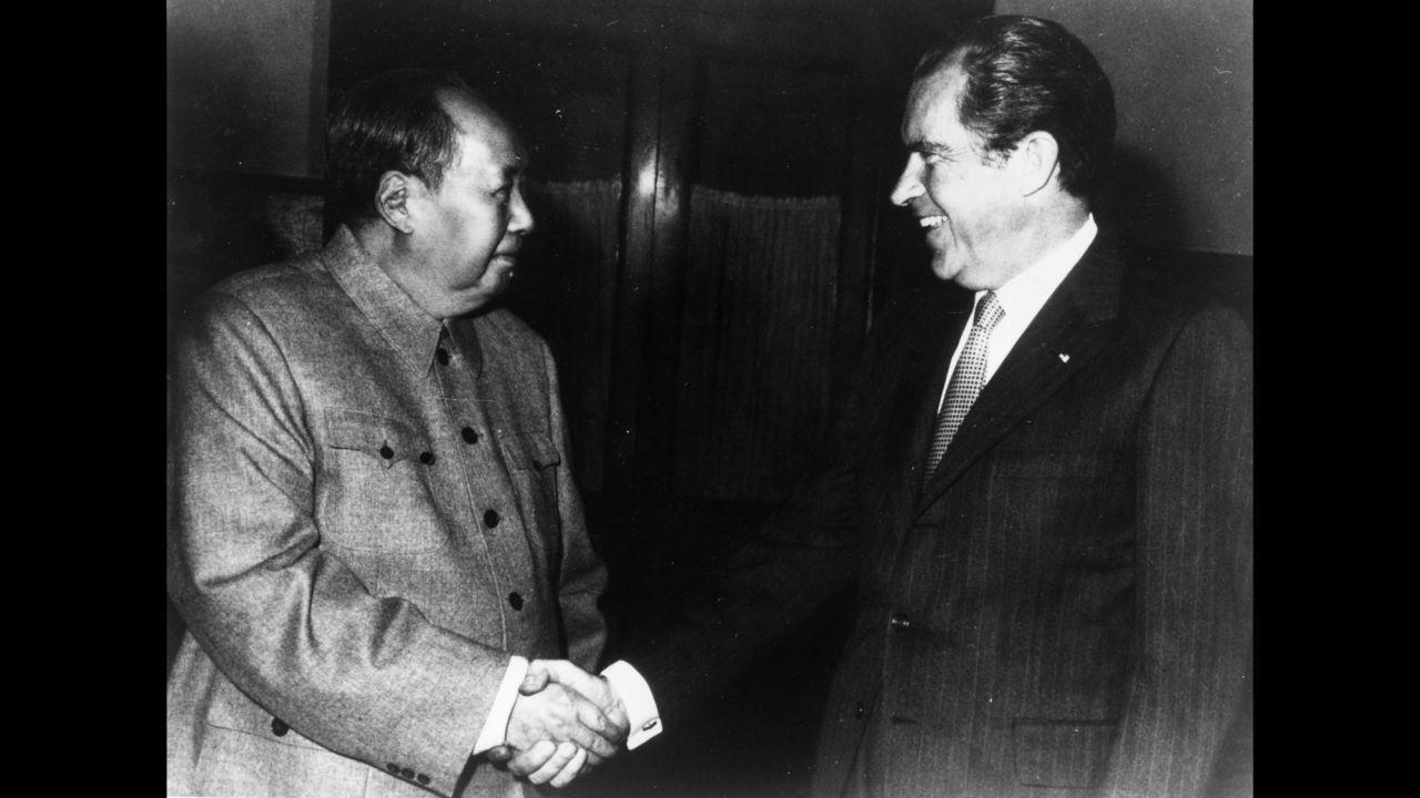 Chinese Communist leader Chairman Mao Zedong, left, shakes hands with U.S. President Richard Nixon in Peking (now called Beijing), on February 21, 1972, during Nixon's historic visit to China.