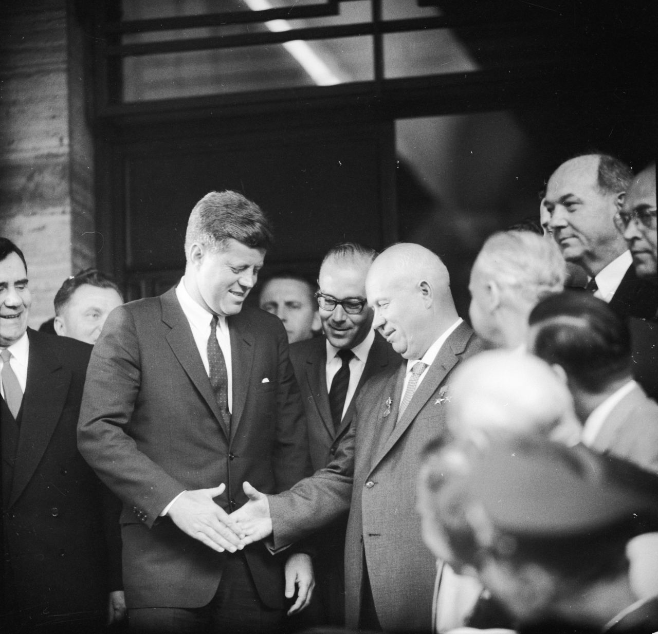 U.S. President John F. Kennedy, left, shakes hands with Soviet leader Nikita Khrushchev at the U.S. Embassy in Vienna, Austria, on June 3, 1961, while meeting for talks. 