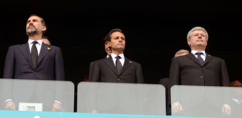 This handout photo released by Mexican presidency press office shows (L-R) Spanish Prince Felipe de Borbon, Mexican President Enrique Pena Nieto an Canadian Prime Minister Stephen Harper on December 10, 2013, while attending the funeral of Nelson Mandela at Soccer City stadium in Johannesburg, South Africa. AFP PHOTO/ MEXICAN PRESIDENCYHO/AFP/Getty Images