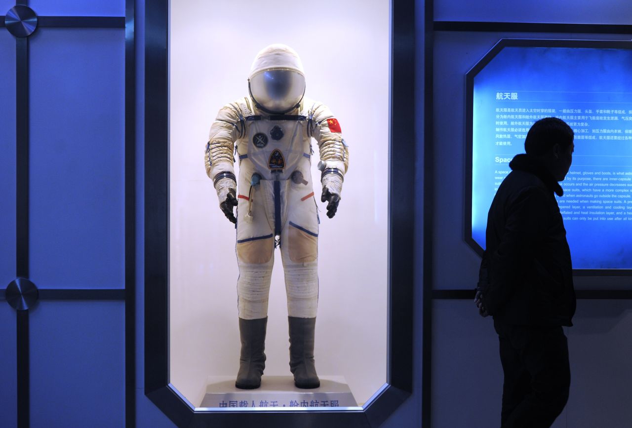 China is pushing to become a global space power, and experts say its ambitions go well beyond a symbolic moon landing, to satellite observation and a global positioning system to rival that of the United States.