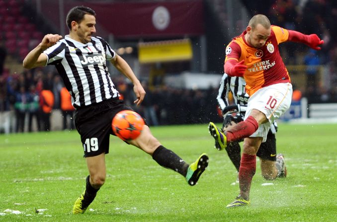 Dutch forward Wesley Sneijder (right) scored a late goal for Galatasaray against Juventus in Istanbul. Victory for the Turkish champions means they and not the Italian league leaders go through to the last 16. The game which started on Tuesday, but was halted after 32 minutes because of a snowstorm, played to a conclusion on Wednesday.  