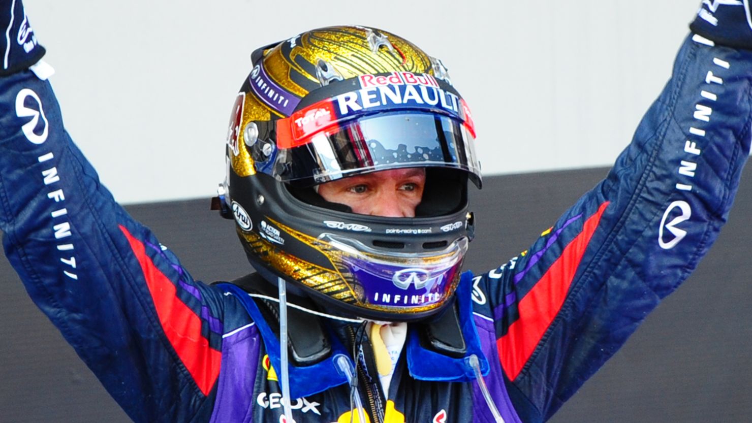 Sebastian Vettel regularly changes his helmet and his gold one worn in Germany (pictured) has sold for a record price