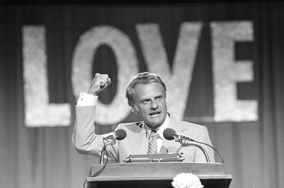 Graham speaks to a crowd of 18,000 on the closing night of the Southern Baptist Convention in 1974.