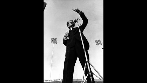 Graham speaks at Liberty Bowl Memorial Stadium in Memphis, Tennessee, in 1978. Inclement weather had forced the crusade to the nearby Mid-South Coliseum, but when the clouds lifted, Graham went to the stadium to speak to those who could not get into the smaller indoor arena.
