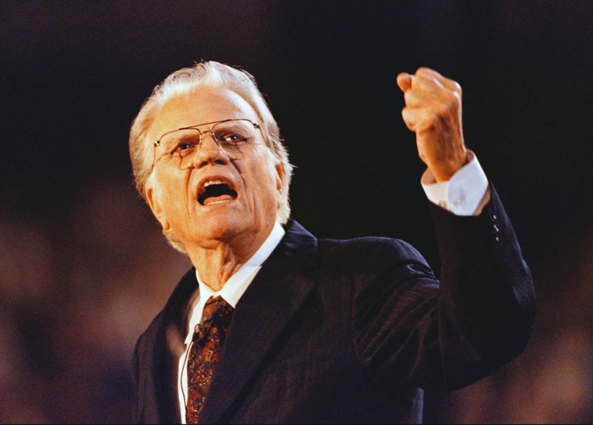 Graham gestures as he speaks to a capacity crowd at Ericsson Stadium in Charlotte, North Carolina, in 1996.