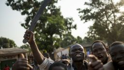 Looters are pictured in Bangui on December 10, 2013.