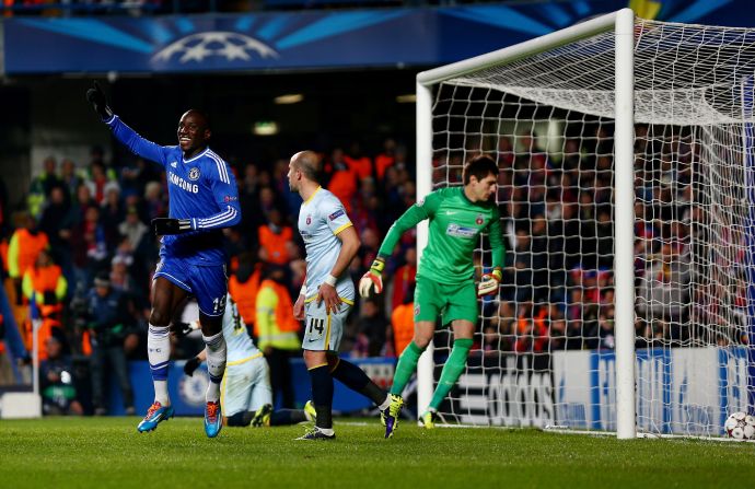 Dembe Ba (left) celebrates Chelsea's opening goal against Steaua Bucharest at Stamford Bridge on Wednesday. Chelsea's 1-0 win against the Romanian champions ensured they finished Group E as winners. 