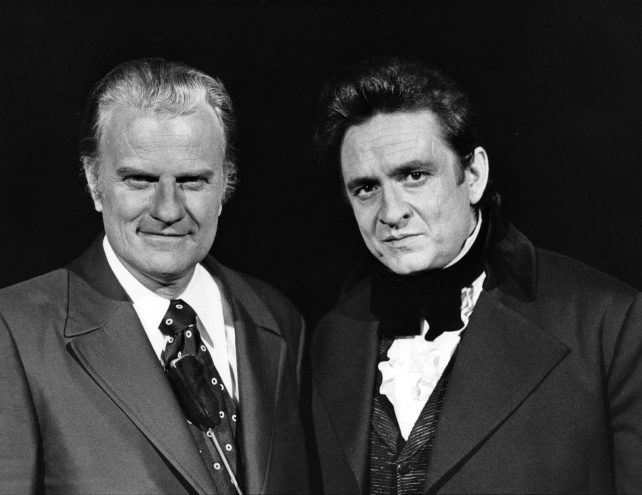 Billy Graham, left, and Cash appear on "The Johnny Cash Show" on February 24, 1971.