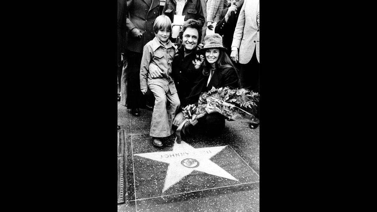 Cash with his wife, June, and son, John, at the dedication of a star honoring him on the Hollywood Walk of Fame in Los Angeles on March 10, 1976.