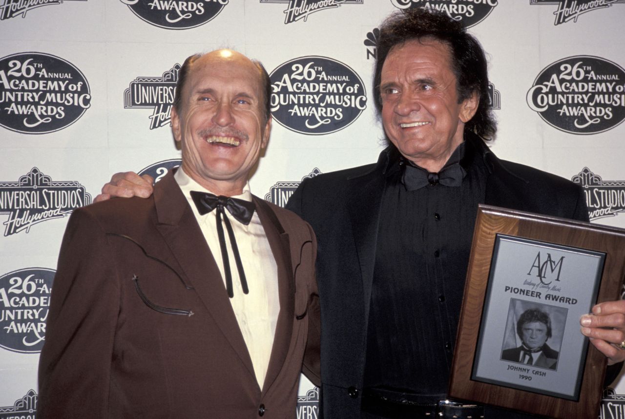 Robert Duvall, left, appears with Johnny Cash during the 26th annual Academy of Country Music Awards in Universal City, California, in 1991.