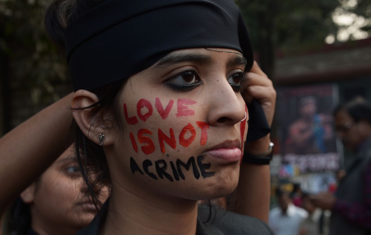 DECEMBER 12 - KOLKATA, INDIA: An Indian gay rights activist takes part in a protest against the <a href="http://cnn.com/2013/12/11/world/asia/india-same-sex-relationship/index.html?hpt=ias_c2">Supreme Court ruling reinstating a ban on gay sex in India</a> on December 11. The colonial-era ban could see homosexuals jailed for up to ten years. In addition, the <a href="http://cnn.com/2013/12/11/world/asia/australia-canberra-same-sex-marriage/index.html?hpt=hp_t3">Australian High Court ruled that a recent local law legalizing same-sex marriage in Canberra was invalid.</a> Both incidents are reopening the debate on the issue in the Asia-Pacific region.