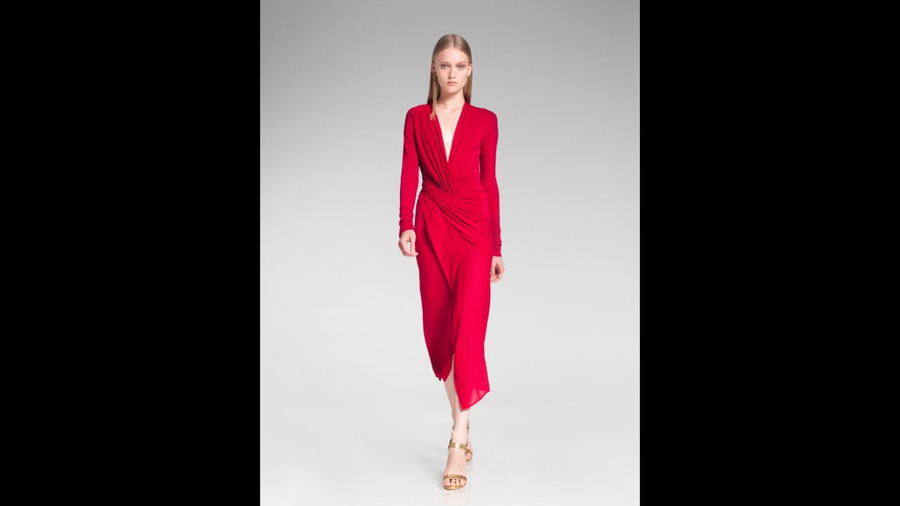 Not sure what it means when that holiday party invitation suggests you "dress festively"? Try these trends for inspiration. This festive red outfit from the 2014 Donna Karan resort presentation is perfect for a party.