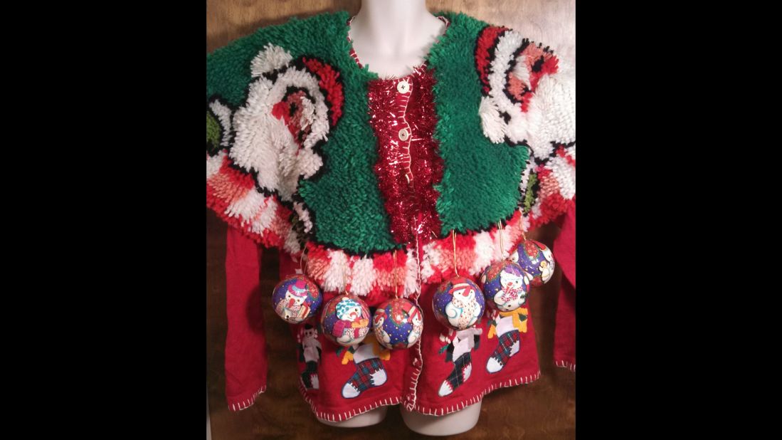 Blackman likes to further embellish her "ugly" sweaters with chenille fringe and Christmas tree ornaments.