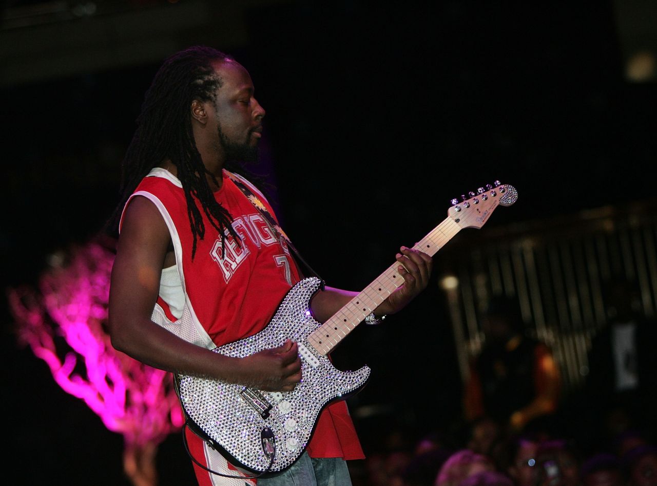 The designer's sparkling creations include a $500,000 diamond-coated guitar for hip-hop artist Wyclef Jean.