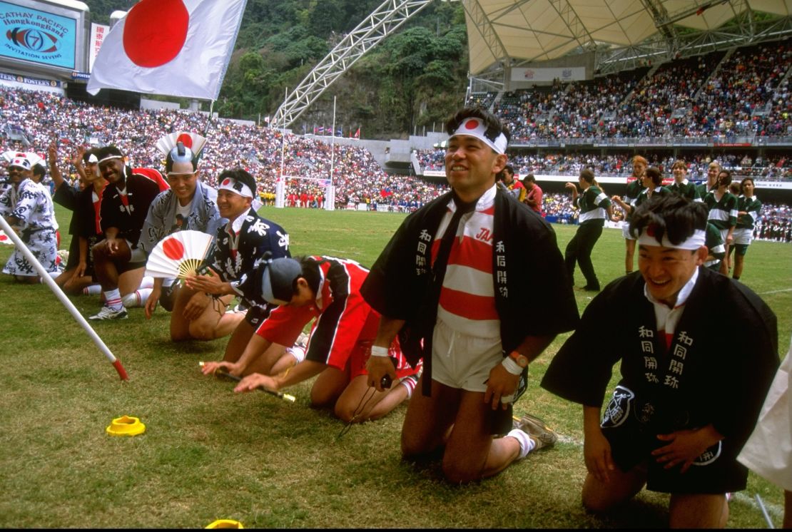 Japanese players salute the crowd at the Hong Kong Rugby Sevens in 1990.