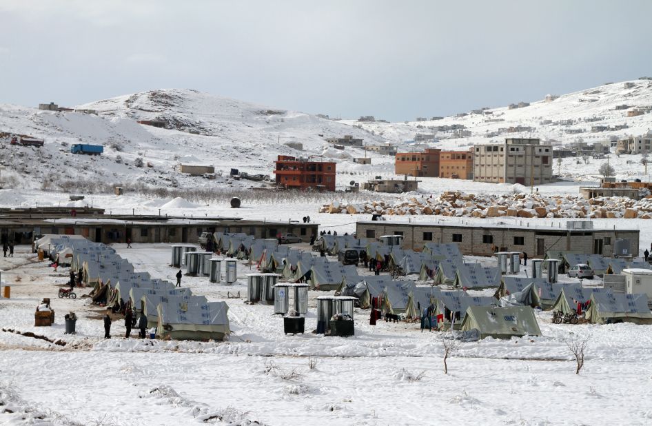 Snow covers the ground at a refugee camp in Arsal on Friday, December 13.