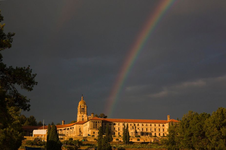 A rainbow forms over the Union Buildings in Pretoria on Thursday, December 12, after the public viewing of Mandela's casket.  