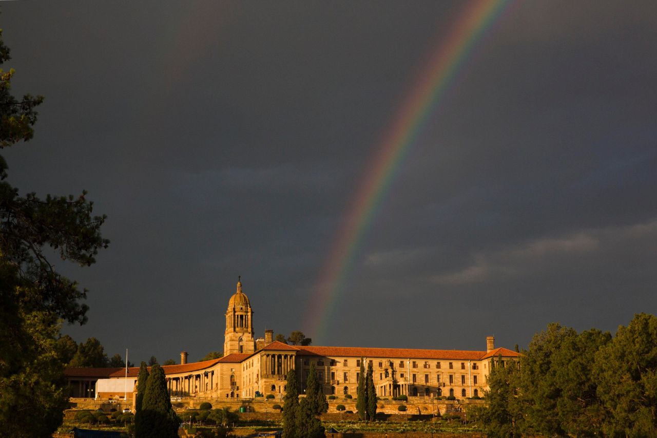A rainbow forms over the Union Buildings in Pretoria on Thursday, December 12, after the public viewing of Mandela's casket.