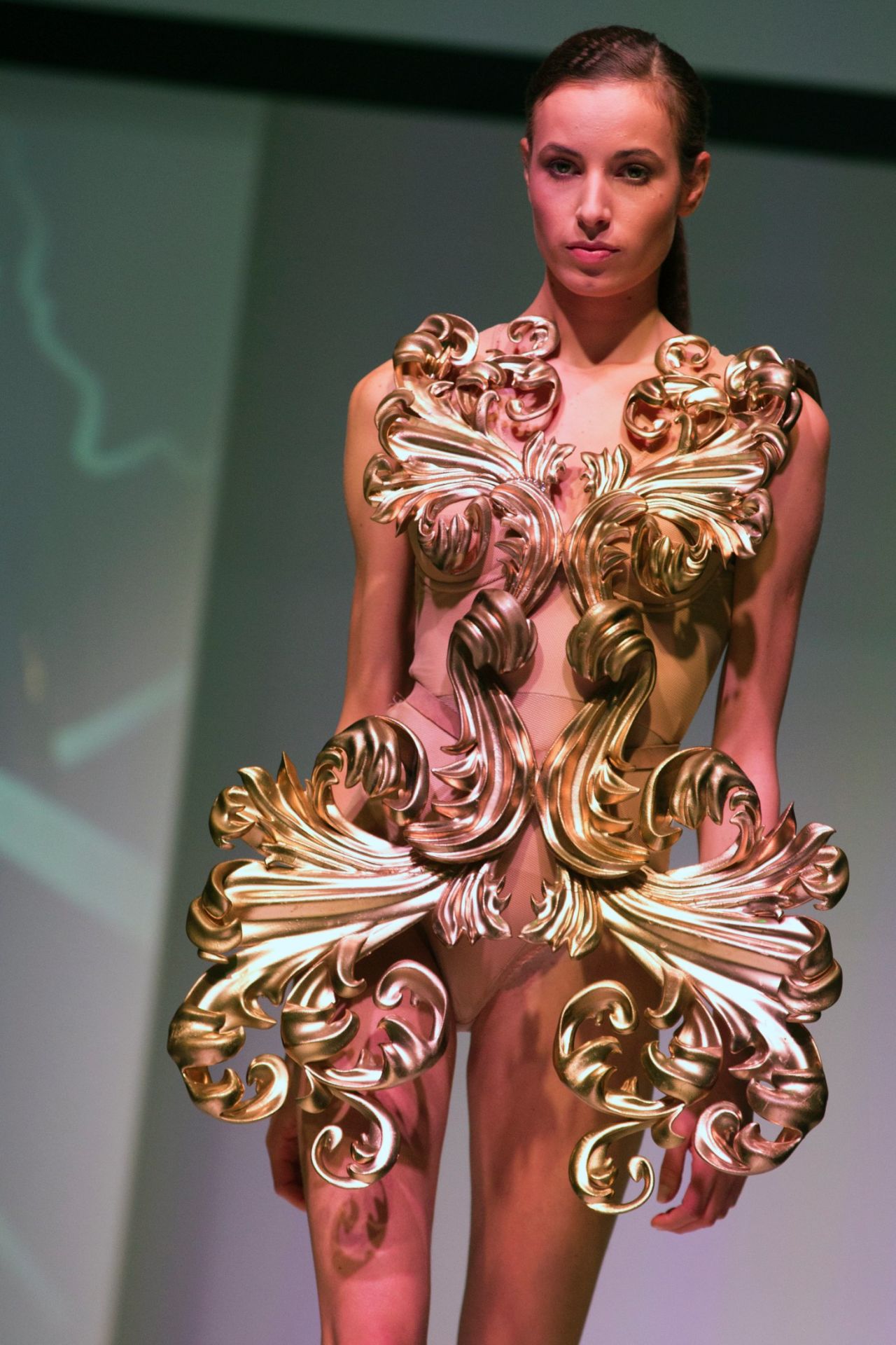 3-D printed dresses can be beautiful, but often seem impractical. For instance, this <a href="http://hinzepia.wix.com/muted" target="_blank" target="_blank">Pia Hinze</a> dress resembles a haute couture shield rather than something a woman would actually wear on a night out. 