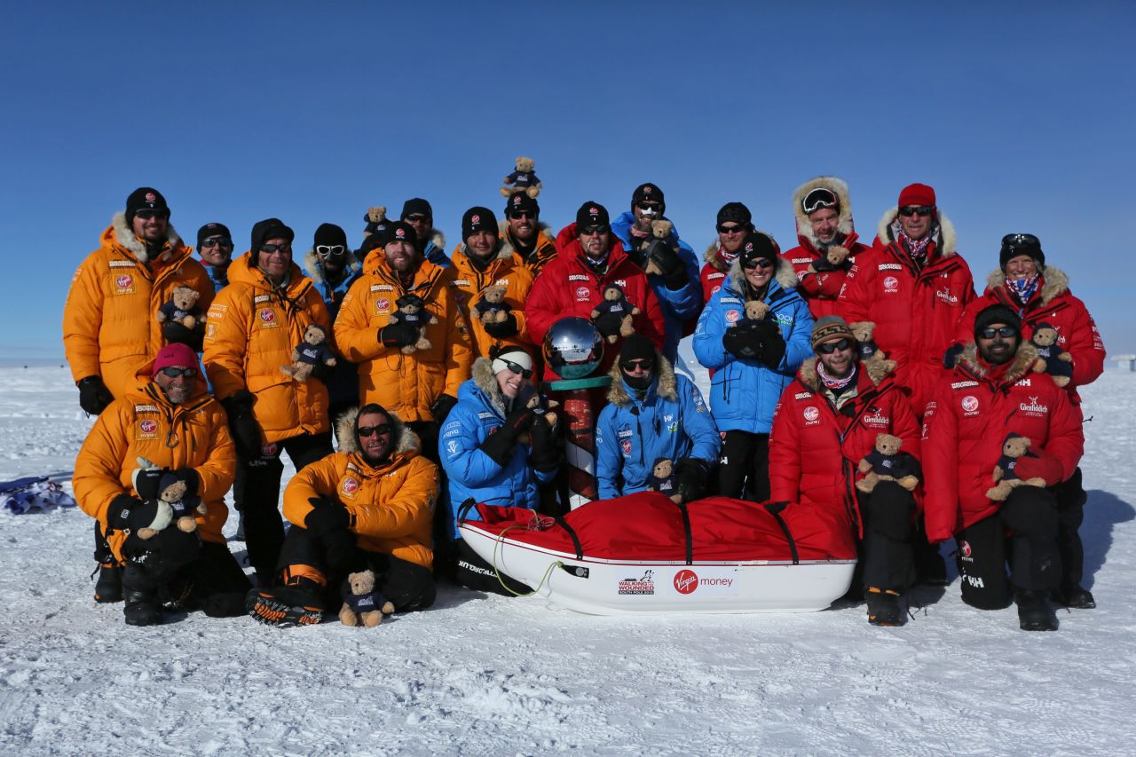 Prince Harry, back row fourth right, with members of Team UK, Team Commonwealth and Team U.S. at the South Pole as part of the Virgin Money South Pole Allied Challenge 2013 on December 13.