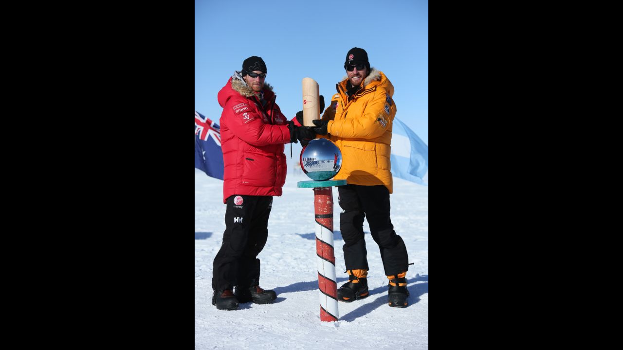 Britain's Prince Harry and Heath Jamieson of Team Commonwealth pose at the bottom of the world.