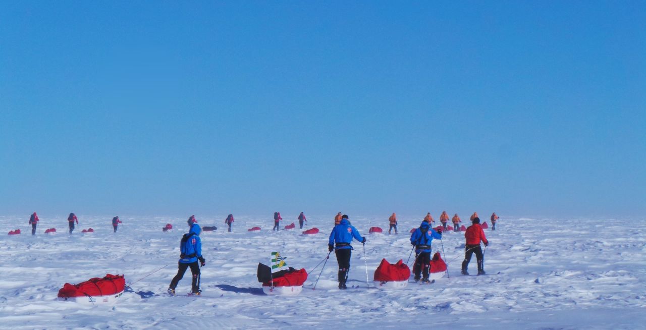Teams trek with their sleds in Antarctica on Day 2. Twelve service personnel from the United Kingdom, the United States, Canada and Australia who have overcome life-changing injuries undertook training programs to prepare for the conditions they have faced in Antarctica.