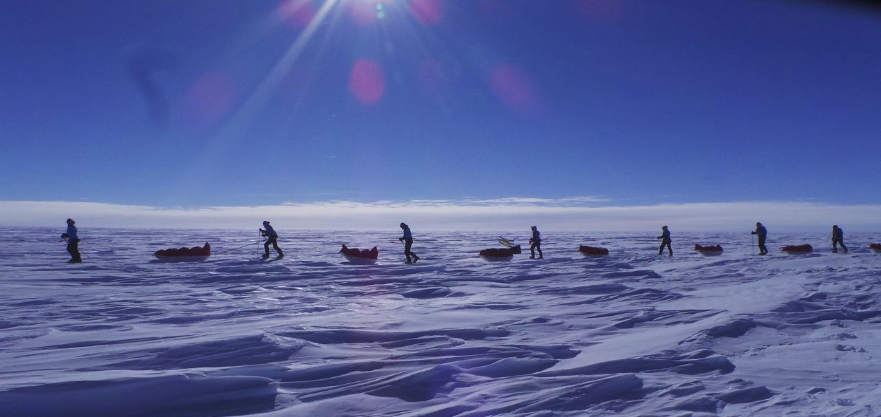 Team U.S. trudges through the snow.