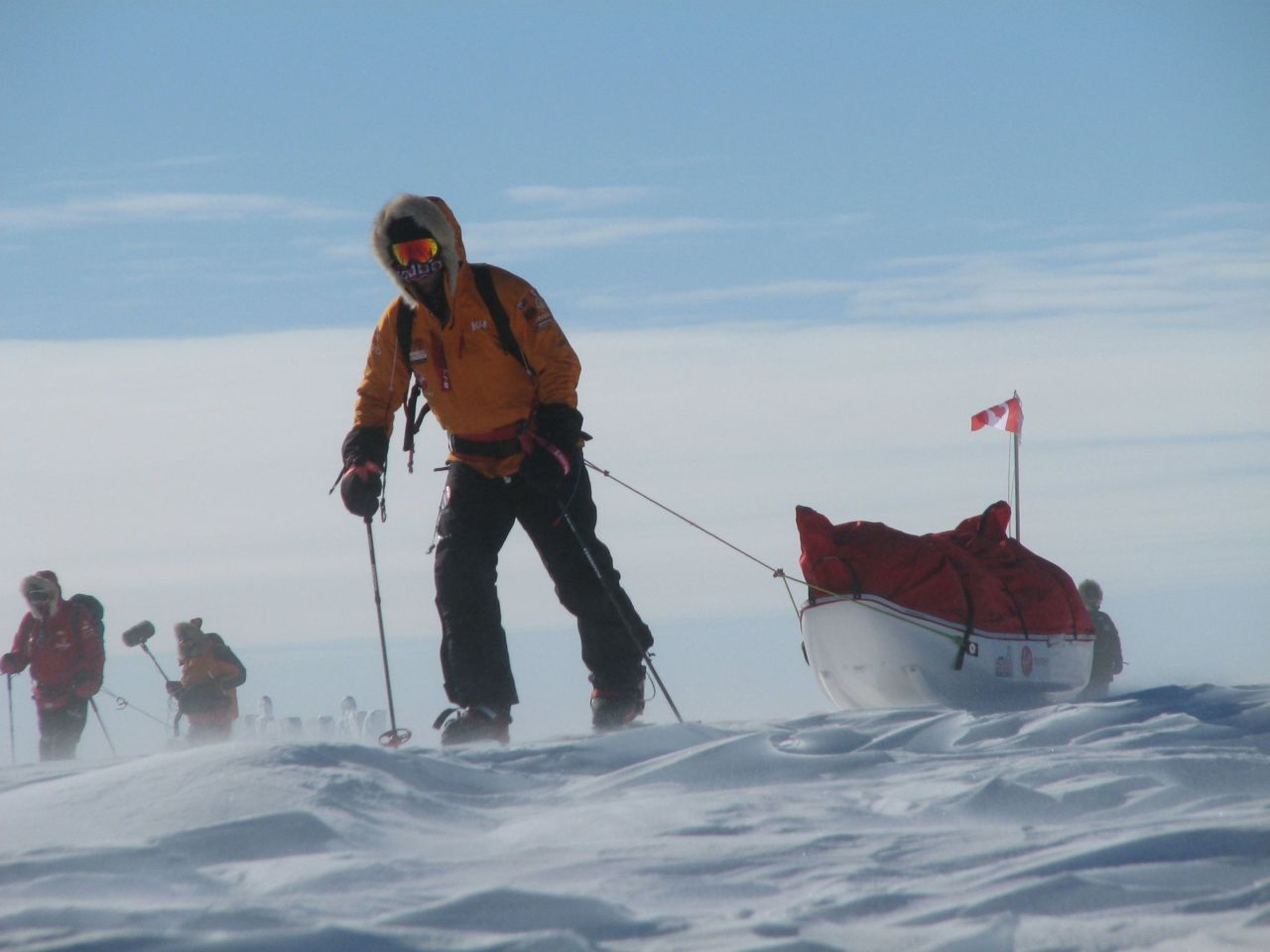 Chris Downey of Team Commonwealth tows his sled.