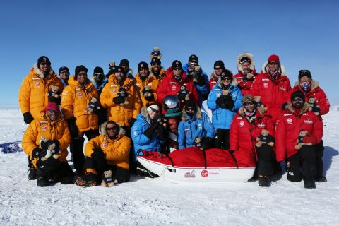 Members of Team U.K., Team Commonwealth and Team U.S. pose as they reach the South Pole. The teams trekked 15 kilometers to 20 kilometers per day and endured temperatures as low as -45 C and 50 mph winds as they pulled their 70 kilogram sleds to the South Pole.