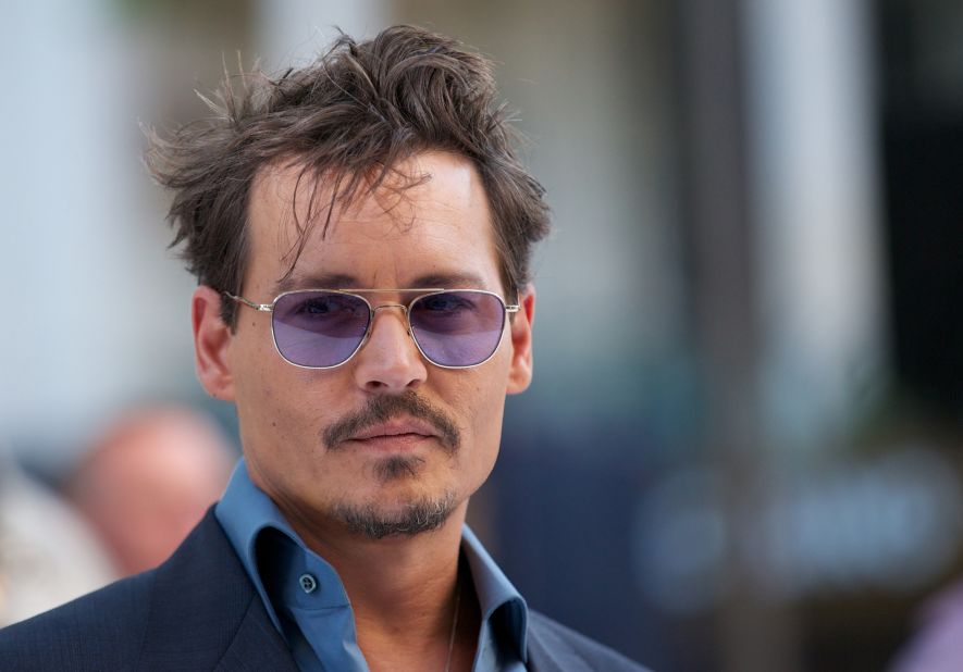 Actor Johnny Depp, who like Pitt was named "Sexiest Man Alive" twice by People magazine, turned 50 on June 9. 