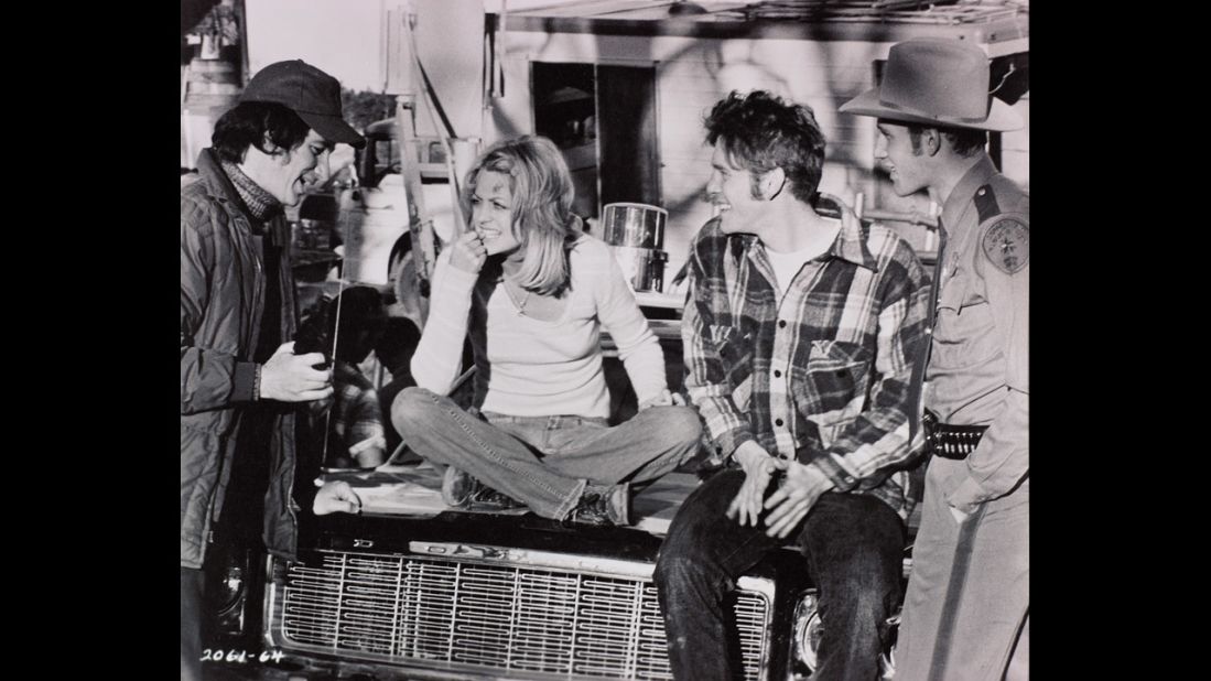 Spielberg, left, talks with actors Goldie Hawn, William Atherton and Michael Sacks on the set of his 1974 film "The Sugarland Express." Prior to that, Spielberg had directed television shows and made-for-TV movies. Spielberg's first film in 1964, "Firelight," was about UFOs attacking a town. 