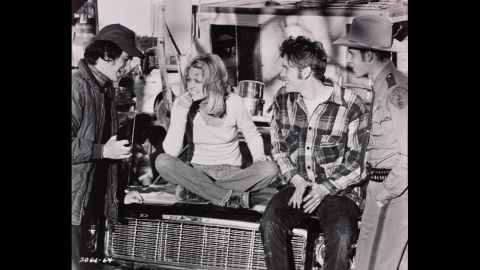 Spielberg, left, talks with actors Goldie Hawn, William Atherton and Michael Sacks on the set of his 1974 film "The Sugarland Express." Prior to that, Spielberg had directed television shows and made-for-TV movies. Spielberg's first film in 1964, "Firelight," was about UFOs attacking a town.