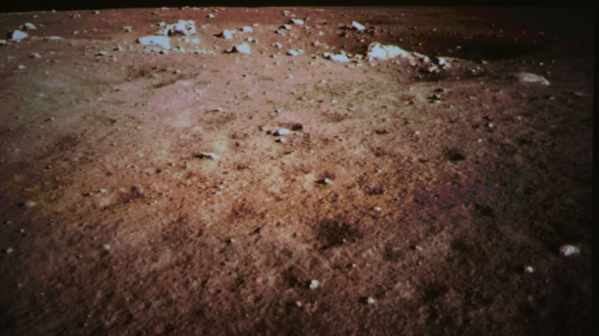 Apicture of the surface of the moon was taken by the on-board camera of China's lunar probe Chang'e-3 is seen on the screen of the Beijing Aerospace Control Center in Beijing, capital of China.