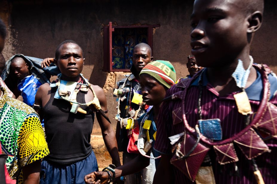 Members of a militia opposed to the Seleka pose with weapons and amulets in the Boy-Rabe neighborhood in Bangui on December 14.