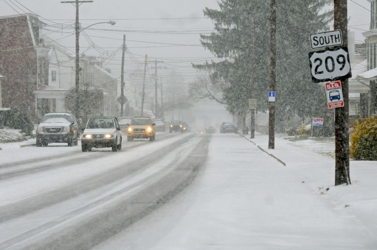 Snow blankets West Market Street in Pottsville, Pennsylvania, on December 14.