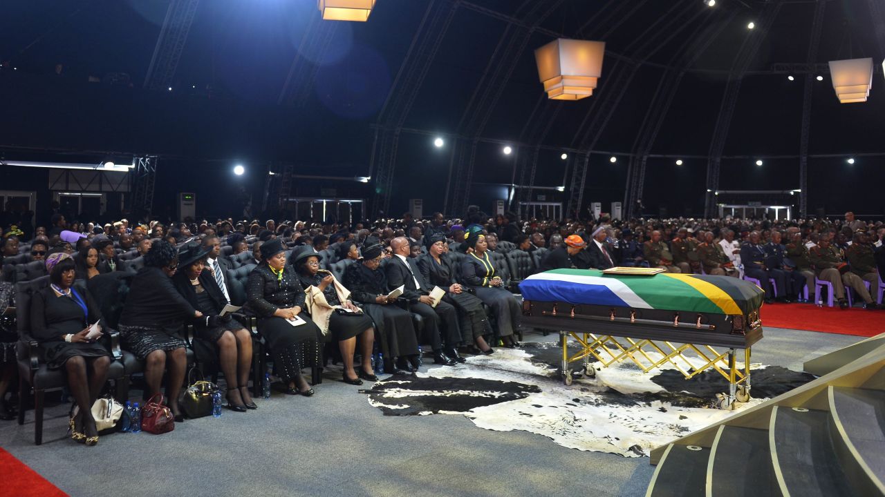 Mandela family members and guests attend the funeral ceremony.