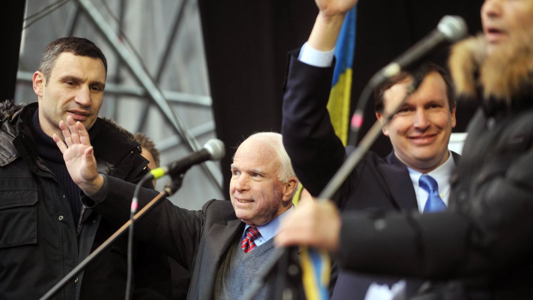 U.S. Sens. John McCain, center, and Chris Murphy, right, join Ukrainian opposition leader Vitali Klitschko during a mass rally at Independence Square on December 15. McCain told protesters seeking closer ties with Europe, "The free world is with you, America is with you." 