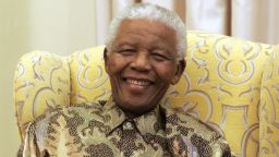 Former South African President Nelson Mandela smiles during an interview with the media at his house in Qunu, on July 18, 2008. Former South African president Nelson Mandela bemoaned the growing gap between rich and poor in his country as he marked his 90th birthday. AFP PHOTO POOL Themba Hadebe (Photo credit should read THEMBA HADEBE/AFP/Getty Images)