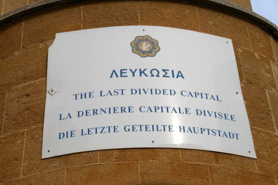 In the center of the old town, a matter-of-fact sign on the wall near the Ledra Street crossing declares that you are standing in "the last divided capital" in the world. 