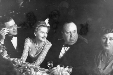 Fontaine, second from left, sits with producer David Selznick, Hitchcock and Hitchcock's wife, Alma, at the Academy Awards presentation dinner in 1941. "Rebecca" won Best Picture that year.