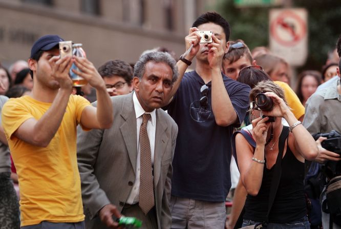 Invented by Kodak engineer Steve Sasson in 1975, the first digital camera used a lens from a movie camera and a digital cassette recorder as a memory card, but it paved the way for all of us who click and snap our way through our vacations today.