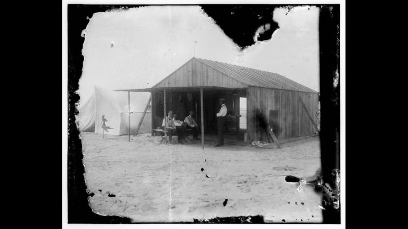 The brothers work at a shed in Kitty Hawk. From left are Octave Chanute, Orville Wright, Edward C. Huffaker and Wilbur Wright.
