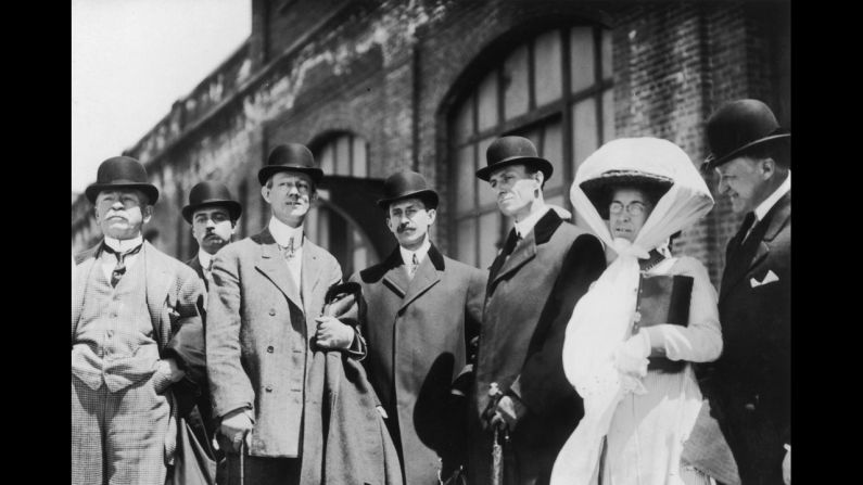 A Wright family portrait is taken upon Wilbur's return from his first official flight demonstration in France in 1908.