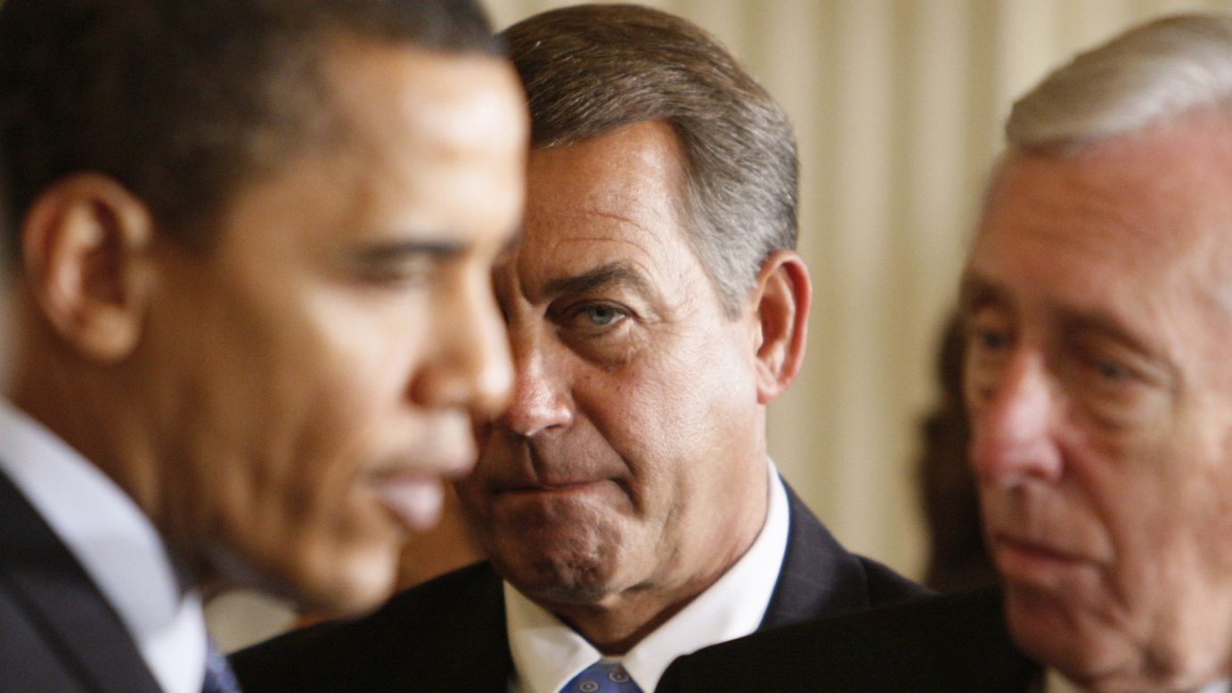 Boehner, center, looks on as President Barack Obama speaks with then-House Majority Leader Steny Hoyer in the East Room of the White House on February 23, 2009. Boehner and Obama have butted heads over the years.