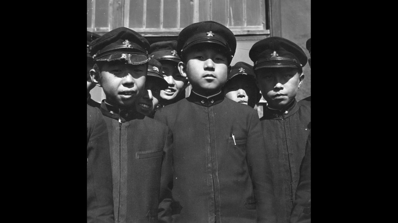 Crown Prince Akihito with some of his school friends at the Imperial School in Tokyo, circa 1938.   