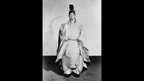 Crown Prince Akihito in ceremonial robes for his formal investiture as crown prince at the Tokyo Imperial Palace on November 10, 1952. 